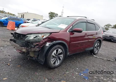 2016 Honda Cr-V Touring z USA, uszkodzony, nr VIN 5J6RM3H93GL001713